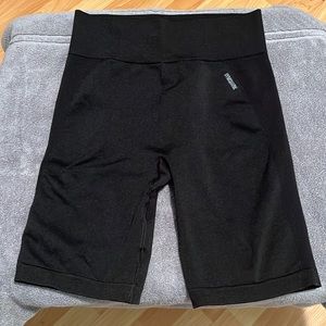 Black Gymshark biker shorts. Size large. In good condition. Worn twice.